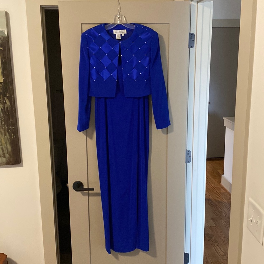 Beautiful blue gown with over coat.